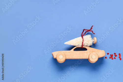 Toy wooden car with small C...