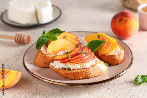 Plate of peach bruschetta w...