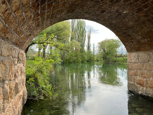 Historic stone bridge on the river Zrmanja, Kastel Zegarski (Velebit Nature Park, Croatia) - Povijesni kameni most na rijeci Zrmanji, Kaštel Žegarski (Park prirode Velebit, Hrvatska) photo