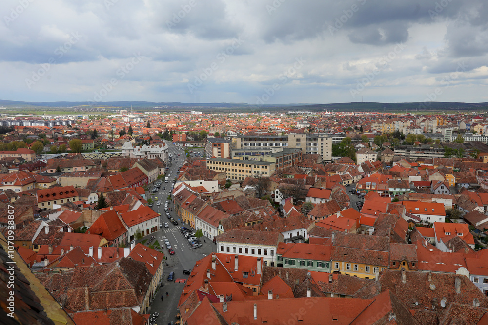 Obraz premium View of Sibiu city, city center of Sibiu in a sunny day. The image are taken from the tower of the Evangelical Cathedral.