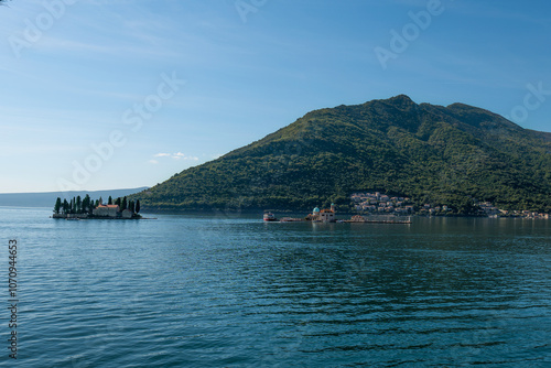 Turquoise water at Perast bay. Our Lady Of The Rocks And The Island Of Saint George photo