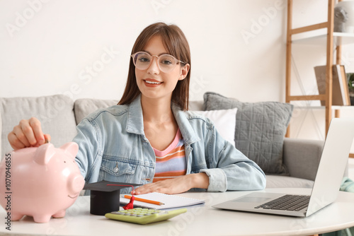 Female student putting coin...