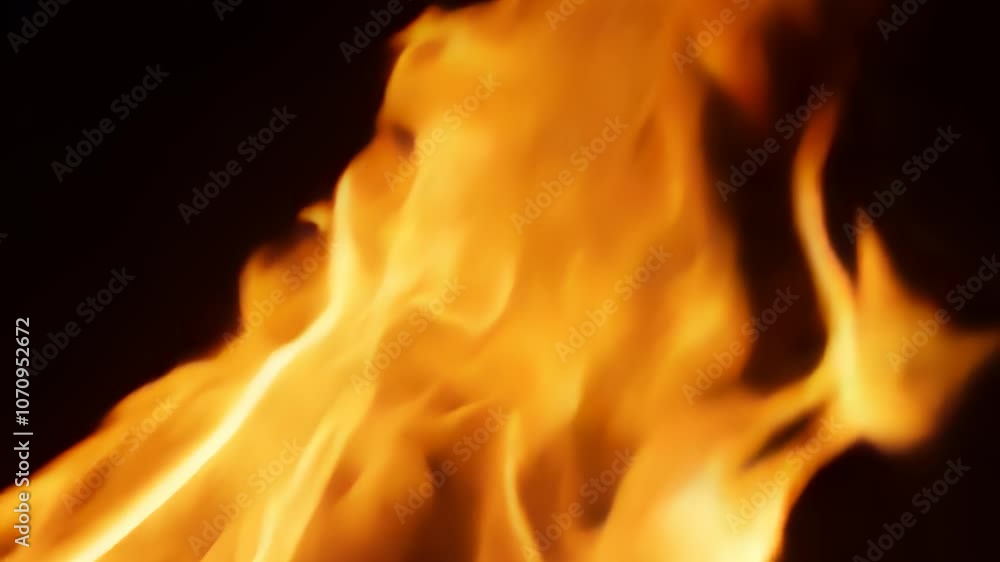 Bright, intense flames rising against a dark background, dynamic and powerful Bright, intense flames rising against a dark background, dynamic and powerful