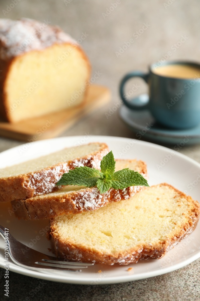 Freshly baked sponge cake and coffee on light grey table, closeup Freshly baked sponge cake and coffee on light grey table, closeup