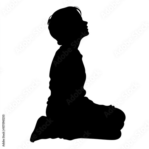 Silhouette Of Kneeling Pers...