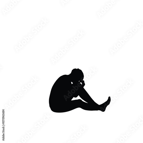 a black silhouette of a person sitting on the ground. The person is sitting with their legs crossed and their head resting on their knees