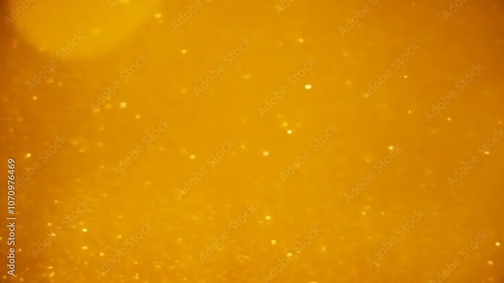 Luxury golden abstract background with gold shining glowing glitter particles texture for design. Luxury golden abstract background with gold shining glowing glitter particles texture for design.