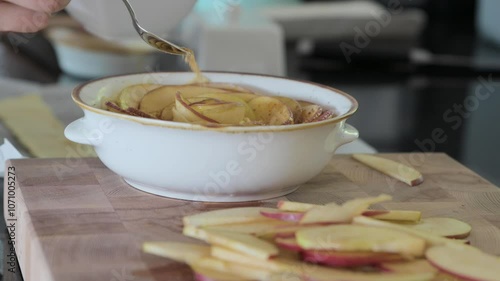 Beautifully crafted apple tart with a golden crust and delicate apple slices, perfect for cozy autumn or winter-themed advertising, social media content, or food promotions. High quality 4k footage