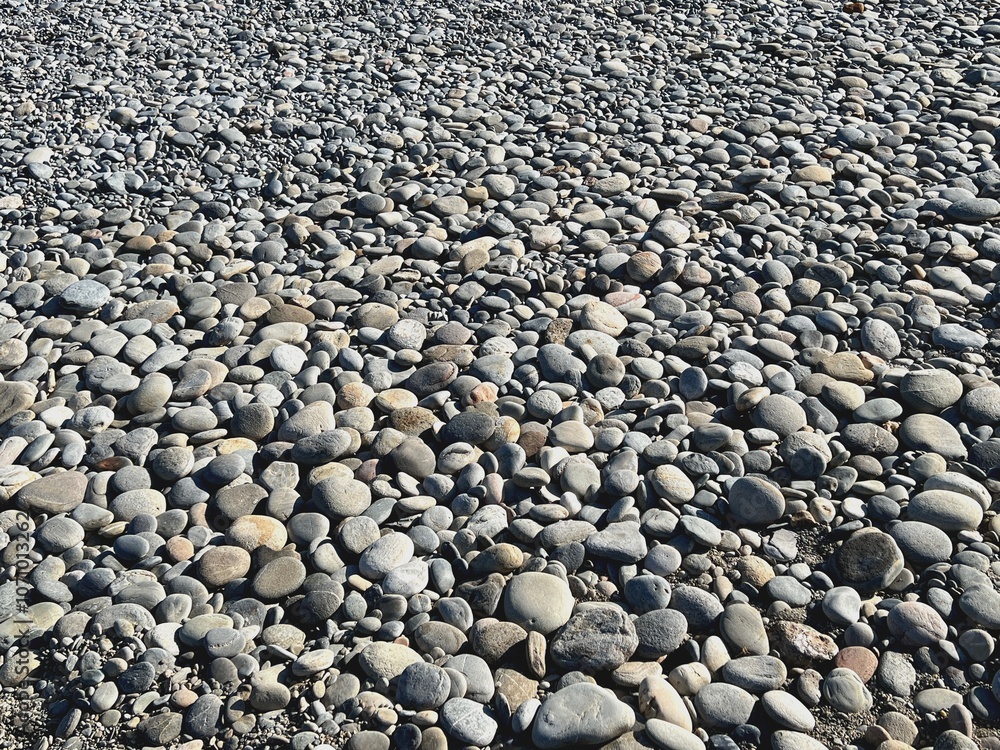 rund geschliffene Kieselsteine am steinigen Strand rund geschliffene Kieselsteine am steinigen Strand