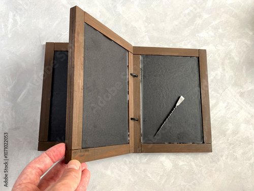 Wax book or bonded wooden tablets. Analogue of medieval book. Writing on wax surface was performed with a pointed instrument, a stylus. Cera (tabula cerata) photo