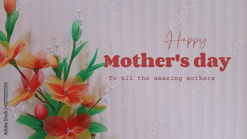 calligraphy poster. Flower decoration for Mother's day. The best Mother's greeting card ever. Artificial flowers for mother's day greeting background. Gift for mother's day.  photo