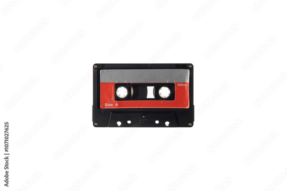 Close-up of an audio cassette with a sticker without text. Analog storage medium. Cassettes for audio recordings and music. Close-up of an audio cassette with a sticker without text. Analog storage medium. Cassettes for audio recordings and music.