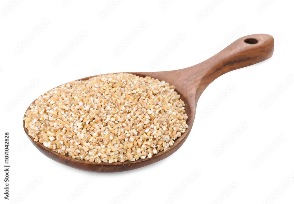 Dry wheat groats in wooden spoon isolated on white Dry wheat groats in wooden spoon isolated on white