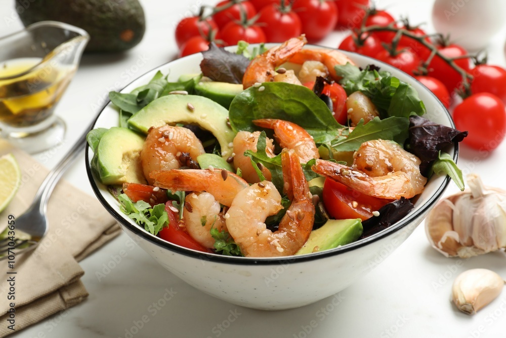 Delicious shrimp salad and ingredients on white table, closeup Delicious shrimp salad and ingredients on white table, closeup