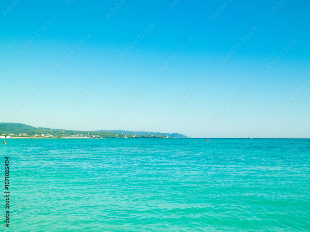 Obraz premium Blue water of Tyrrhenian sea in Vada, Tuscany, Italy.