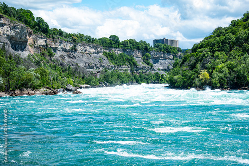 Bild auf Leinwand blue rushing river water in canada