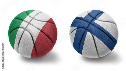 basketball balls with the national flags of finland and italy on the white background. photo