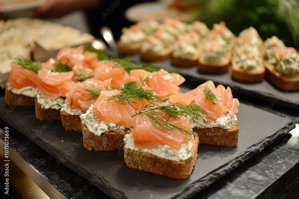 Dill and horseradish pâté with smoked salmon and cream cheese on square rye slices Dill and horseradish pâté with smoked salmon and cream cheese on square rye slices