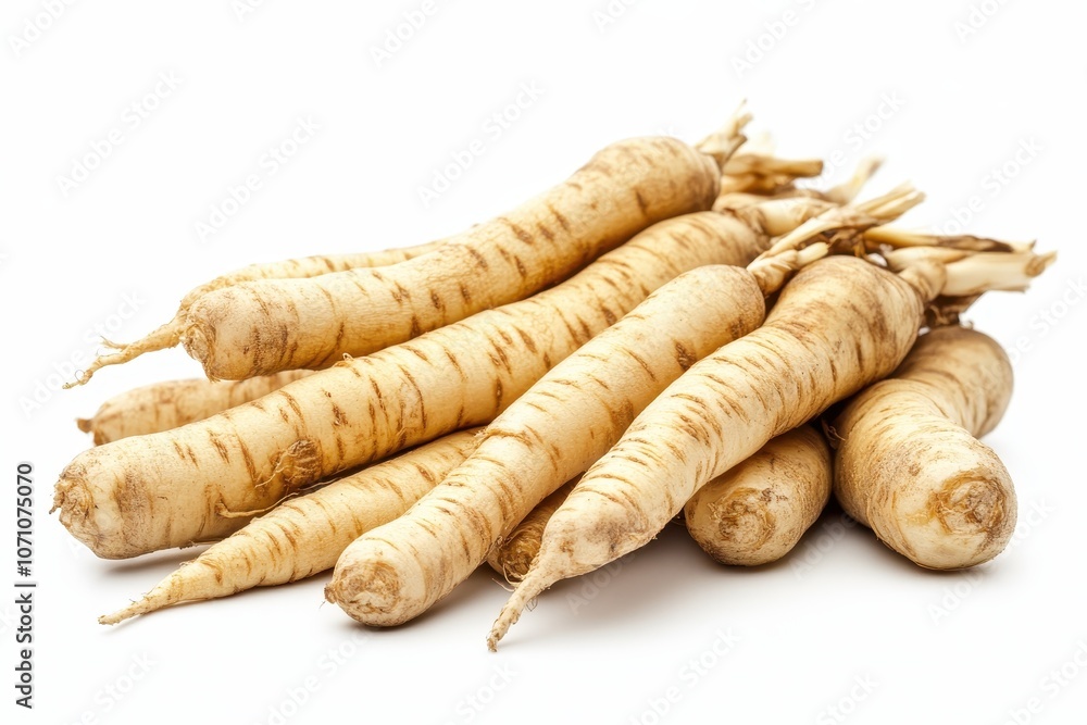 Ginseng roots a Chinese herbal medicine displayed on a white backdrop Ginseng roots a Chinese herbal medicine displayed on a white backdrop