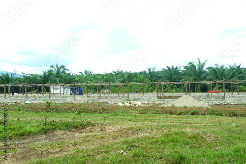 unfinished architectural buildings made of concrete and wood