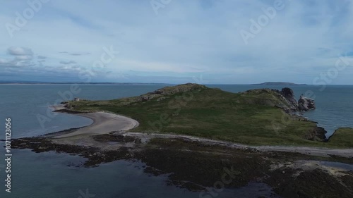 Amazing drone video around Ireland's Eye, a small long-uninhabited island off the coast of County Dublin, Ireland., near Howth village and harbour, with a small martello tower.