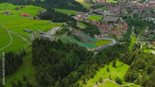 Schattenberg Skistadion in Oberstdorf, Deutschland Luftaufnahme. Orlen Arena Oberstdorf Allgau. Ski jumping stadium in Bavaria, Germany aerial view. Skisprungstadion am Schattenberg in Allgauer Alpen photo