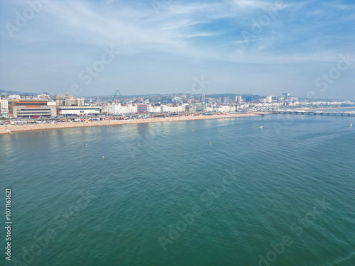Wallpaper Mural Aerial View of British Tourist Attraction of Beach and Ocean at Brighton and Hove Coastal City of England United Kingdom. High angle Footage of British Tourist Attraction Was Captured on May 9th, 2024 Torontodigital.ca