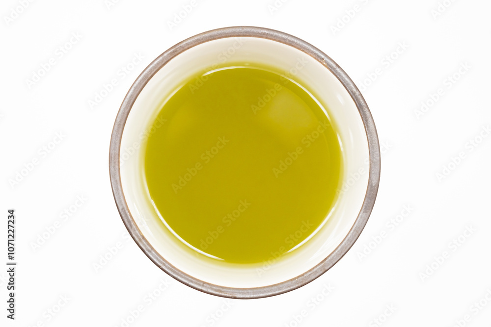 Top view of green tea cup isolated on white background. Japanese green tea. Top view of green tea cup isolated on white background. Japanese green tea.