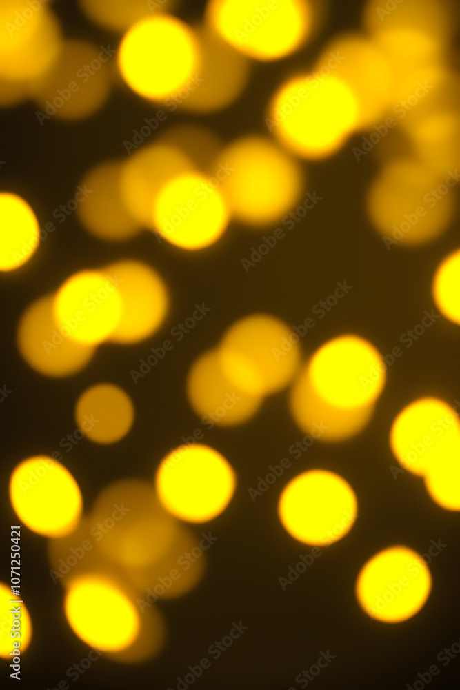 Obraz premium Ethereal Yellow Bokeh Lights Abstract Background