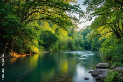 Peaceful river flowing through a dense forest, vibrant green foliage. Created with generative AI technology