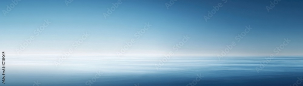 Obraz premium A View of the Ocean and Sky with a Gradual Blue Gradient