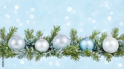 Elegant Silver Christmas Ornaments Surrounded by Pine Branches
