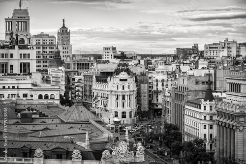 Black and white photo of the historic buildings of the city of Madrid, capital of Spain. photo