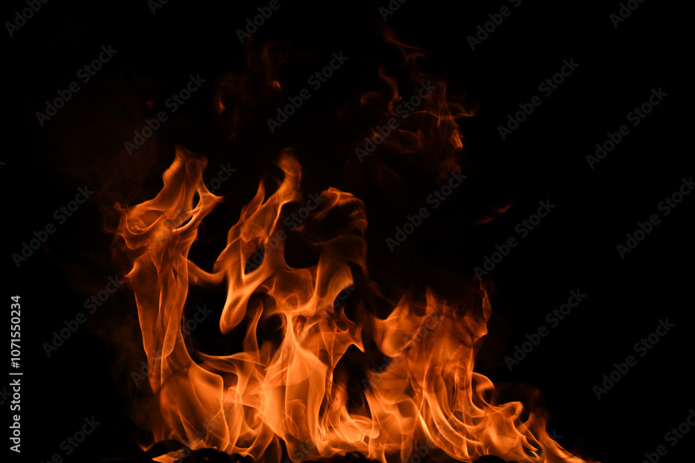 Fototapeta premium Fire flame isolate on black background. Burn flames, abstract texture. Art design for fire pattern, flame texture.