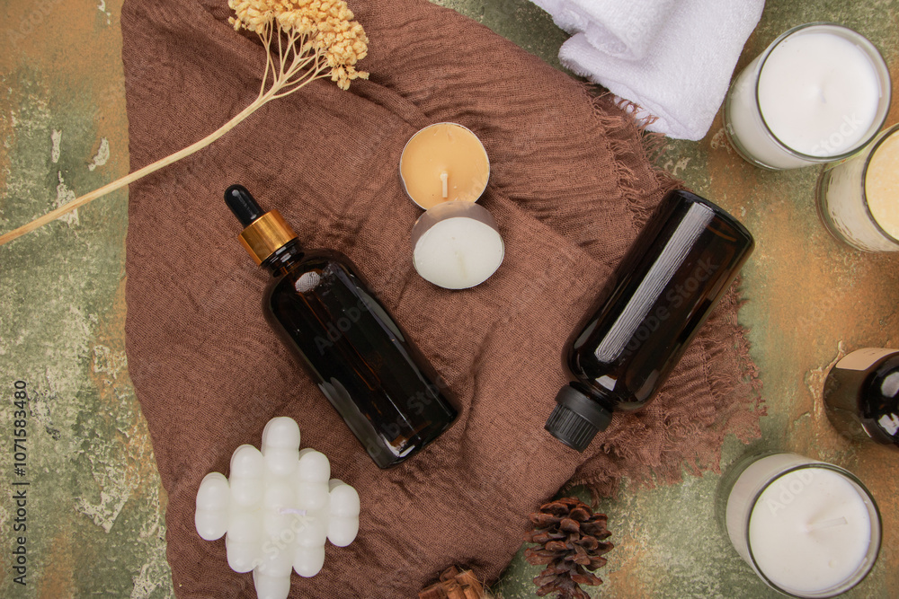 Amber Glass Bottles with Natural Elements and Candles for Skincare and Aromatherapy Branding Amber Glass Bottles with Natural Elements and Candles for Skincare and Aromatherapy Branding