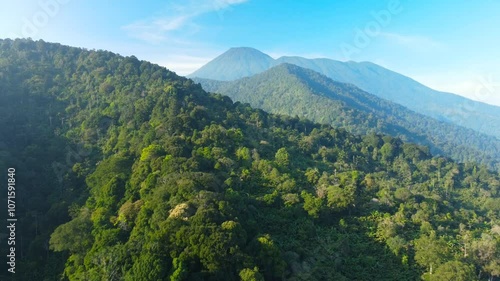 Mountains landscape. Aerial View of Mount Gede Pangrango in the morning with blue sky in West Java. Natural tourist area in Puncak Bogor.