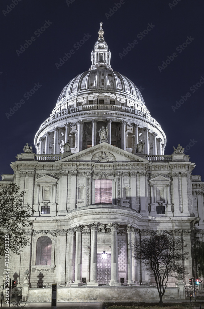Beautiful view of St. Paul's Cathedral illuminated at night in London. Gothic architecture of saint pauls Anglican Cathedral Dome, Space for text, Selective focus. Beautiful view of St. Paul's Cathedral illuminated at night in London. Gothic architecture of saint pauls Anglican Cathedral Dome, Space for text, Selective focus.