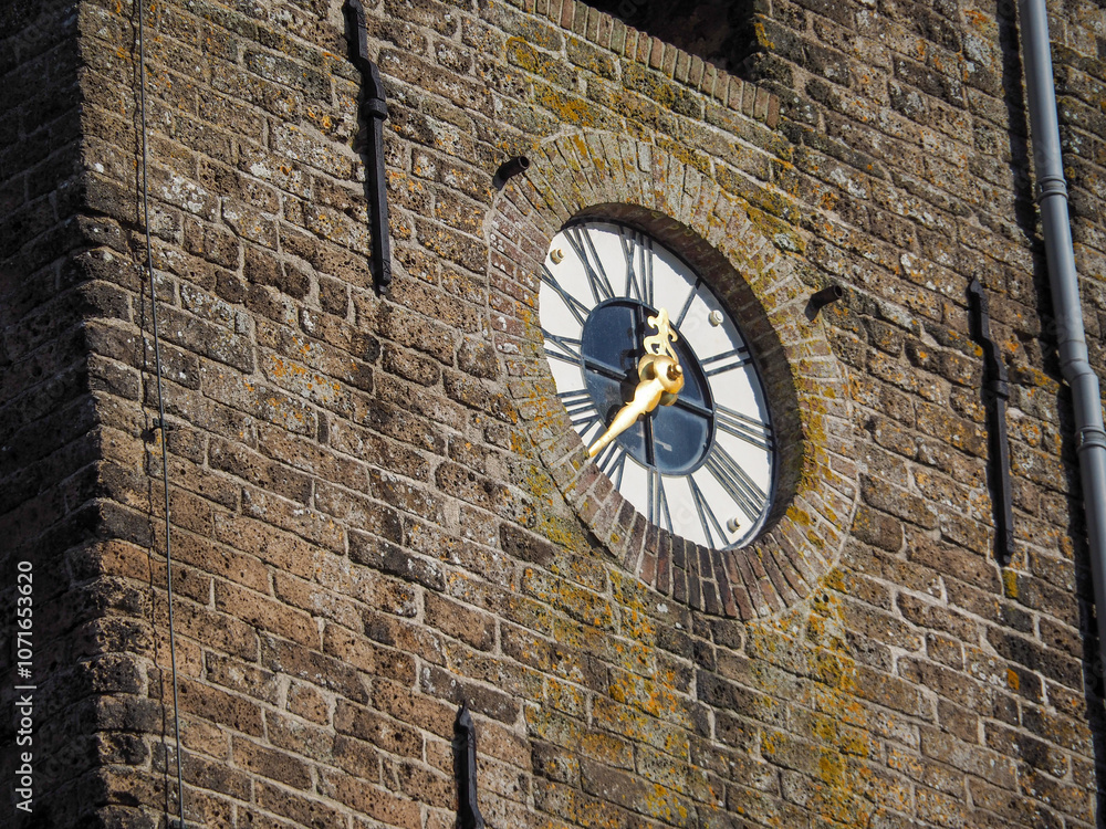 Fototapeta premium Church in Friesland in the Netherlands, close up clock
