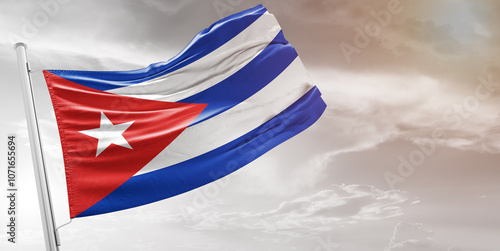 Cuba national flag cloth fabric waving on beautiful grey Background.