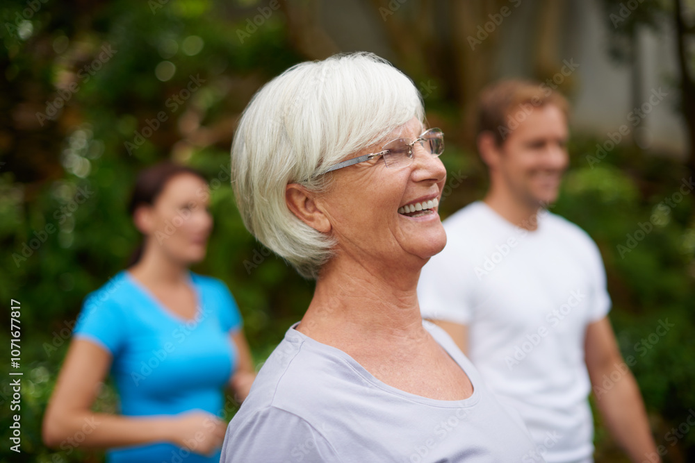 Obraz premium Park, happy senior woman or people in yoga class for wellness, balance or inner peace. Group meditation, smile or funny elderly person laughing in nature for spiritual healing energy or mindfulness