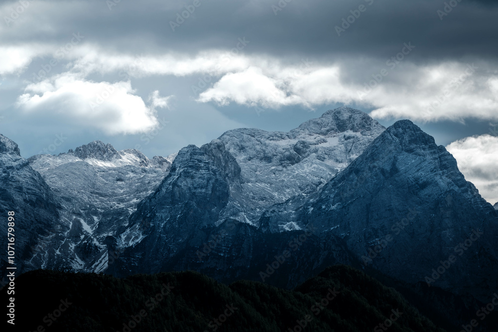 Fototapeta premium Clouds over mount Triglav, Slovenia