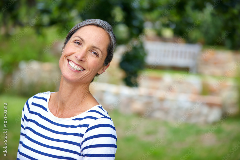 Mature woman, smile and portrait in garden, nature and excited in backyard with sunshine in morning. Person, happy and outdoor with confidence, pride and break on lawn, summer and blur in Croatia Mature woman, smile and portrait in garden, nature and excited in backyard with sunshine in morning. Person, happy and outdoor with confidence, pride and break on lawn, summer and blur in Croatia
