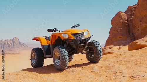 An orange ATV conquers rocky steep hills in the desert under bright daylight, showcasing power and adventure in rugged terrain