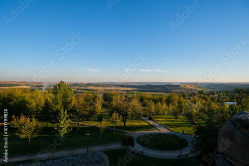 Panoramic View of Diyarbakır's Lush Green Park and Surrounding Landscape at Sunset