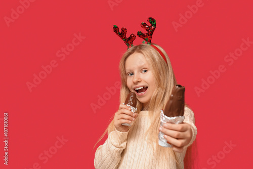 Cute little girl in reindee...