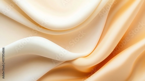 Soft flowing fabric in cream and peach hues. photo