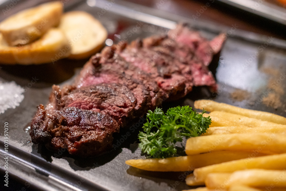 Medium rare picanha angus steak served on plate Medium rare picanha angus steak served on plate