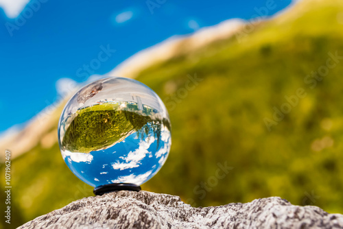 Crystal ball alpine summer landscape shot at the famous Hintertux glacier, Tux, Schwaz, Zell am Ziller, Tyrol, Austria photo