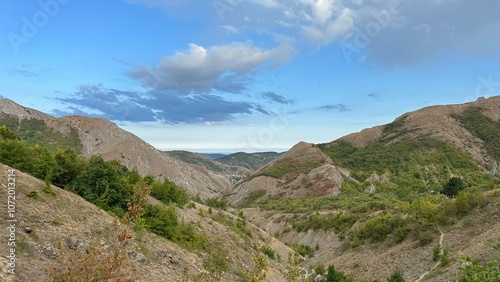 landscape with sky and clouds and mountains