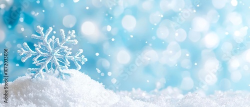 A snowflake sitting on top of a pile of snow